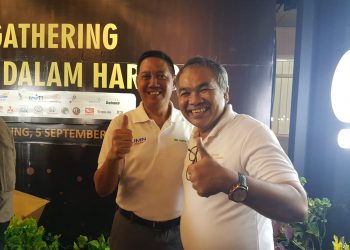 DR Aqua Dwipayana Bersama Dirut Pengadaian Kuswiyoto foto Cakraline.com