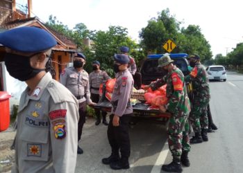 Luar-Biasa-TNI-Polri-di-NTB-Kompak-Gelar-Patroli-Skala-Besar-Pencegahan-Covid-19-foto-Its